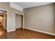 Bedroom featuring vinyl floor, baseboards, neutral paint, and closet at 5217 Yellow Dawn Ct, Las Vegas, NV 89130