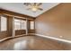 Spacious primary bedroom featuring a bay window and a ceiling fan at 5217 Yellow Dawn Ct, Las Vegas, NV 89130