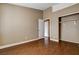 Bedroom featuring vinyl floor, baseboards, neutral paint, and closet at 5217 Yellow Dawn Ct, Las Vegas, NV 89130