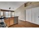 Kitchen view with stainless steel dishwasher and a pantry around the corner at 5217 Yellow Dawn Ct, Las Vegas, NV 89130