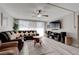 Spacious living room featuring neutral-colored walls and large windows for ample natural light at 730 S Royal Crest Cir # 421, Las Vegas, NV 89169