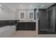 Elegant bathroom with double vanity and large shower at 303 Vallarte Dr, Henderson, NV 89014