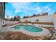 Relaxing kidney-shaped pool with flagstone patio and water feature at 303 Vallarte Dr, Henderson, NV 89014