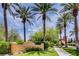 Village center entrance with landscaping and building view at 4414 Regalo Bello St, Las Vegas, NV 89135