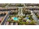 Aerial view of community amenities including a pool and playground in a residential area at 7579 Harwich Bay Ave, Las Vegas, NV 89179