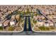 Aerial view of a residential community featuring well-maintained streets, desert landscaping, and Gathering homes at 7579 Harwich Bay Ave, Las Vegas, NV 89179