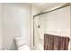 Clean and modern bathroom with a glass enclosed shower and a toilet at 7579 Harwich Bay Ave, Las Vegas, NV 89179