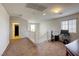 Upstairs loft area with neutral carpet, plenty of natural light, and space for office at 7579 Harwich Bay Ave, Las Vegas, NV 89179