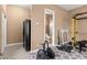 Spacious basement features workout area with exercise equipment, bathroom and storage at 10234 Renae Nicole Ct, Las Vegas, NV 89183