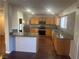 Well-lit kitchen featuring granite countertops, stainless steel appliances, and ample cabinet space at 11177 Deluna St, Las Vegas, NV 89141