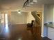 Spacious living room with hardwood floors and staircase leading to the second floor at 11177 Deluna St, Las Vegas, NV 89141