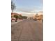 Peaceful street view featuring tidy landscaping and residences at 11177 Deluna St, Las Vegas, NV 89141