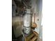 Standard water heater unit with nearby shelving and storage space at 11177 Deluna St, Las Vegas, NV 89141