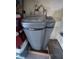 Water softener installed indoors on a small platform, sits next to storage at 11177 Deluna St, Las Vegas, NV 89141