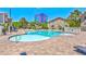 Community pool area with ample lounge seating and clear views of the surrounding landscape at 4200 S Valley View Blvd # 3030, Las Vegas, NV 89103