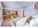 Bedroom featuring a ceiling fan, large built-in bookcase, and closet space at 5255 Dickens Dr # 0, Las Vegas, NV 89119