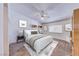 Bright bedroom offering a ceiling fan, built-in shelving, and a neutral color scheme at 5255 Dickens Dr # 0, Las Vegas, NV 89119