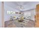 Bright living room with light walls, ceiling fan, and hardwood floor at 5255 Dickens Dr # 0, Las Vegas, NV 89119