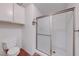 Clean and well-maintained shower with glass sliding doors and tile surround at 5255 Dickens Dr # 0, Las Vegas, NV 89119