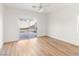 Well-lit bedroom with a ceiling fan and sliding glass doors to the backyard at 7936 Pinnochio Ave, Las Vegas, NV 89131