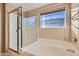 Bathroom with soaking tub and a separate shower stall at 9790 Overlook Ridge Ave, Las Vegas, NV 89148