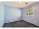 Bright bedroom with carpeted floor and window coverings at 9790 Overlook Ridge Ave, Las Vegas, NV 89148