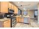 Well-equipped kitchen with stainless steel appliances at 9790 Overlook Ridge Ave, Las Vegas, NV 89148