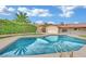 Inviting swimming pool in sunny backyard at 1501 Strong Dr, Las Vegas, NV 89102