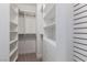 Large walk-in closet with custom built-in shelving and drawers at 2108 Grand Island Ct, Las Vegas, NV 89117