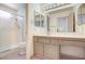 Bathroom featuring marble countertops, modern fixtures, and bright natural lighting at 3013 Sungold Dr, Las Vegas, NV 89134