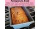 A fresh-baked loaf of homemade pomegranate bread in a baking pan at 3013 Sungold Dr, Las Vegas, NV 89134