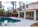 Relaxing pool and spa area with covered patio at 6365 Black Swan Ln, Las Vegas, NV 89118