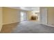 Bright living room with sliding doors to a balcony and an open floor plan at 5301 River Glen Dr # 210, Las Vegas, NV 89103