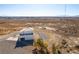 Aerial view of house, showing the desert landscape at 3490 S Adobe Ct, Pahrump, NV 89048