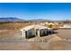 Two-story house with mountain views and large yard at 3490 S Adobe Ct, Pahrump, NV 89048