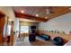 Finished basement offers a large recreational area with wood-paneled walls at 3490 S Adobe Ct, Pahrump, NV 89048