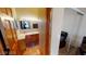 Clean bathroom with wood vanity, tile flooring, and a mirrored medicine cabinet at 3490 S Adobe Ct, Pahrump, NV 89048
