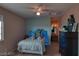 Cozy bedroom with a dresser and a unique light setup at 3490 S Adobe Ct, Pahrump, NV 89048