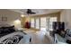Bright bedroom with patio access and ceiling fan at 3490 S Adobe Ct, Pahrump, NV 89048