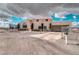 Two-story house with attached garage and fenced yard at 3490 S Adobe Ct, Pahrump, NV 89048