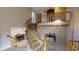 Elegant curved staircase leading to upper level, with open concept layout at 3490 S Adobe Ct, Pahrump, NV 89048