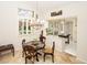 Bright dining area with chandelier and view into kitchen at 4911 Mount Pleasant Ln, Las Vegas, NV 89113