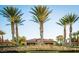 Spanish Trail community entrance with palm trees at 4911 Mount Pleasant Ln, Las Vegas, NV 89113