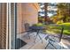 Small patio with table and chairs, great for outdoor dining at 4911 Mount Pleasant Ln, Las Vegas, NV 89113