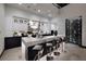 Sleek modern kitchen with high-end appliances, stylish bar seating, and temperature-controlled wine storage at 500 Overlook Rim Dr, Henderson, NV 89012