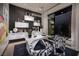 Bright office with unique desk, bold art, and natural light, creating an inspiring workspace at 500 Overlook Rim Dr, Henderson, NV 89012