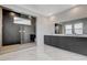 Modern bathroom with double vanity and large walk-in shower at 9002 Shifting Skye St, Las Vegas, NV 89166