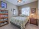 Bright bedroom with double bed and wood furniture at 10260 Danskin Dr, Las Vegas, NV 89166