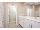 Modern bathroom with double vanity and walk-in shower at 11236 Rainbow Peak Ave # 210, Las Vegas, NV 89135