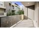 A contemporary patio with a metal railing offers a private outdoor space at 11236 Rainbow Peak Ave # 210, Las Vegas, NV 89135